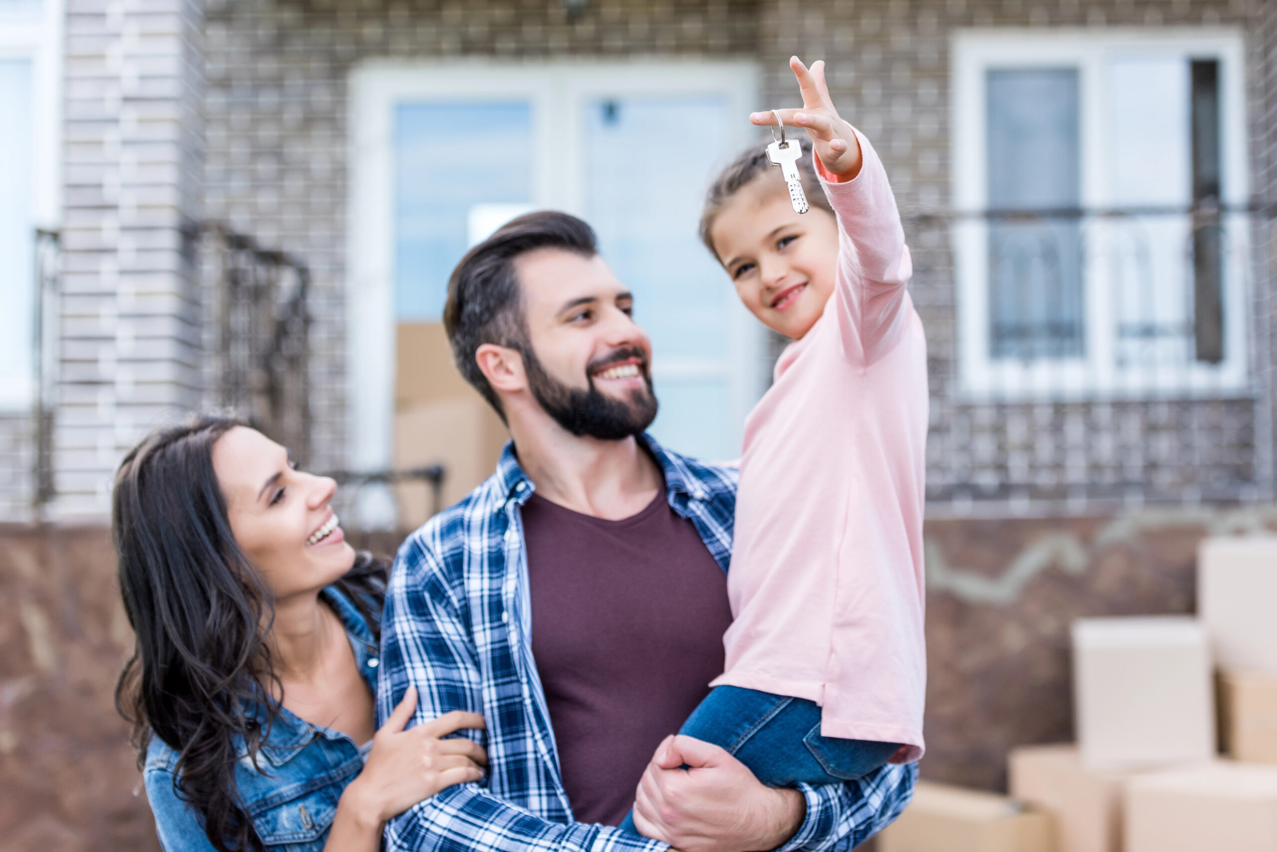 Family with young daughter moving into new house