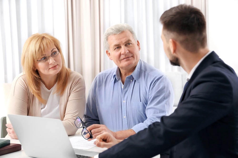 Trust-Lawyer-Warwick-RI-elderly-couple-in.-meeting-with-lawyer