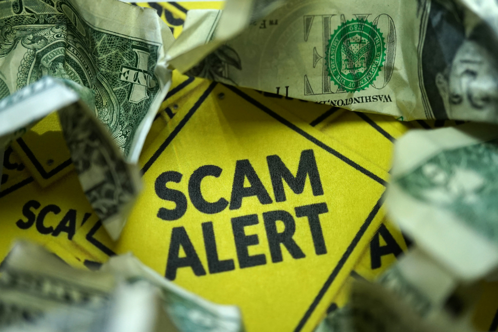DMV Scam Alert Image with Money for Unpaid Tolls